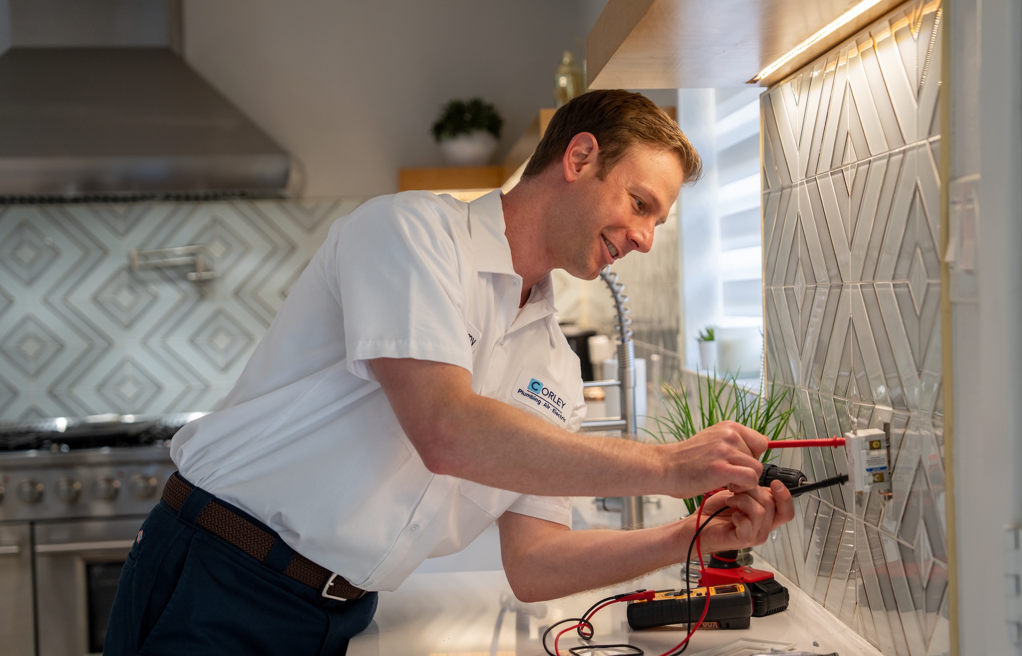 A Professional Fixing an Air Conditioner